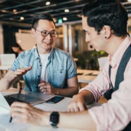 Coworker with hearing loss works with another coworker